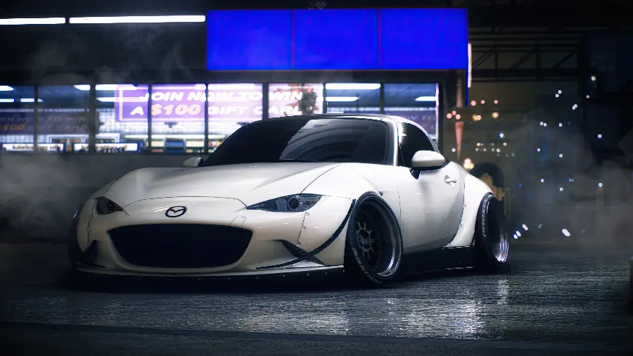 A very beautiful poster of a cool white Mazda sports car for Windows background