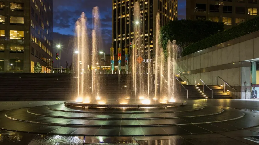 Photo of the fountain at the entrance to downtown Los Angeles at night