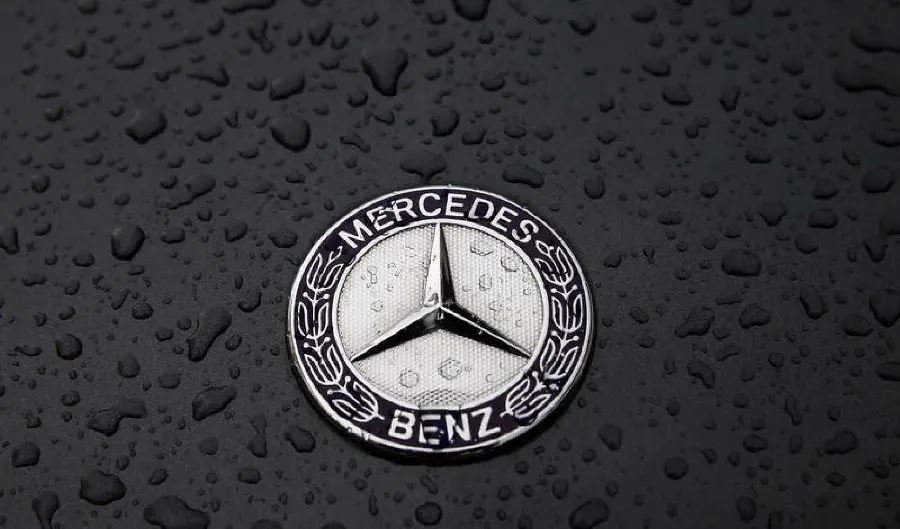 Beautiful background of Mercedes Benz logo with raindrops