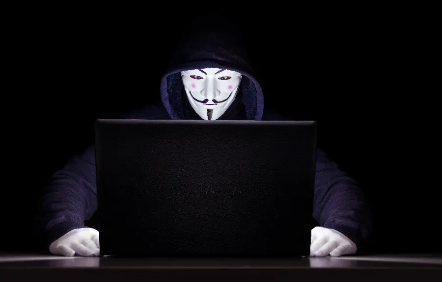 Photo of the most famous black hat hacker in history on a black background