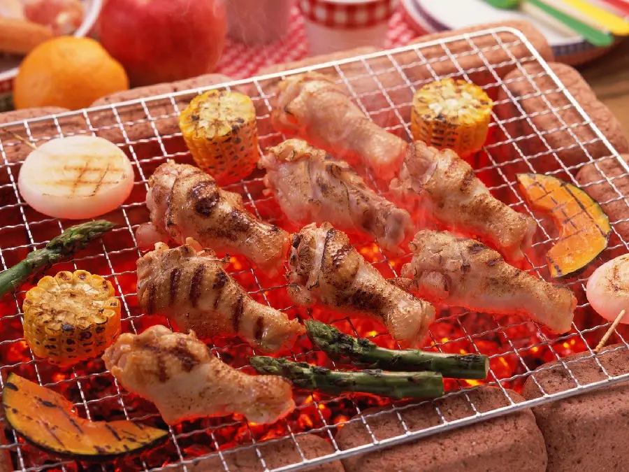 Good quality background of raw chicken kebab with corn, onion and asparagus