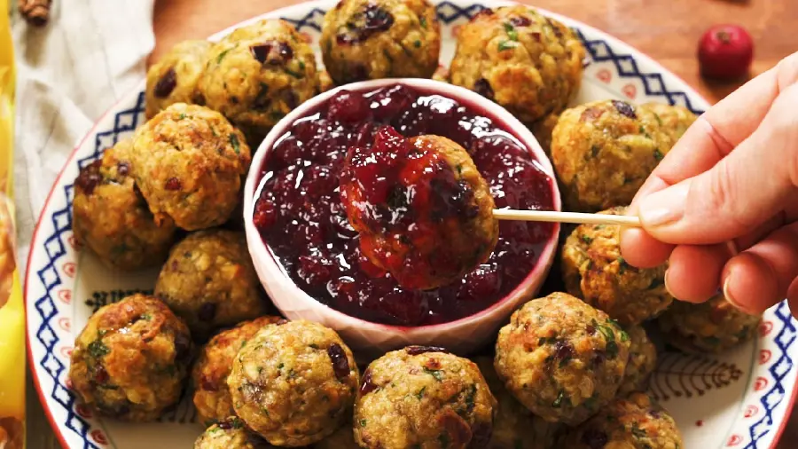 The best picture of a gorgeous and Barq Kofte on a beautiful plate with a delicious cherry sauce