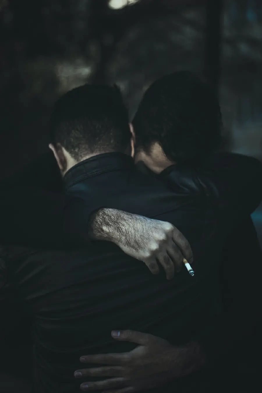 Dark boy's profile for social networks from the embrace of two friends 2022