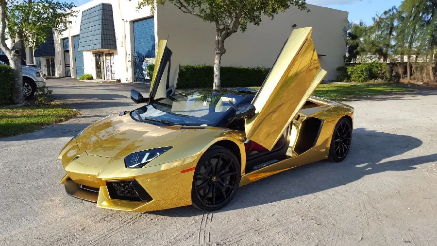 Attractive Background Photo of a Golden Lamborghini with Open Doors for Windows 10 and 11