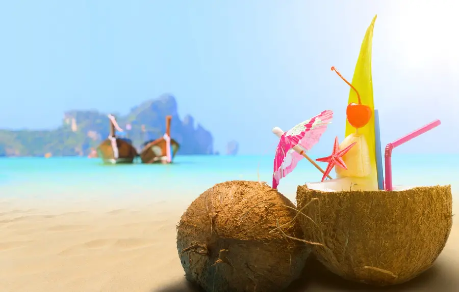 A brilliant digital image of a coconut drink with beautiful and unique details on the beach