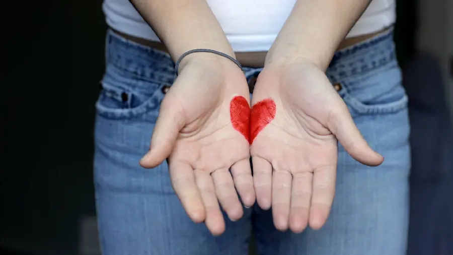 The most famous red heart with hand photo for profile in excellent quality 