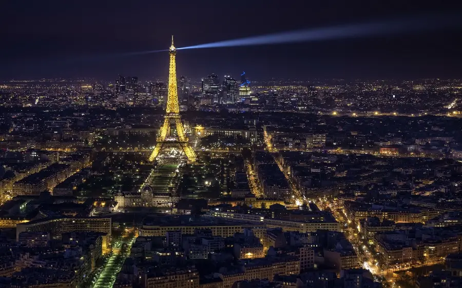 Download a masterpiece photo of the city of Paris, a symbol of French culture at night and the Eiffel Tower in its heart