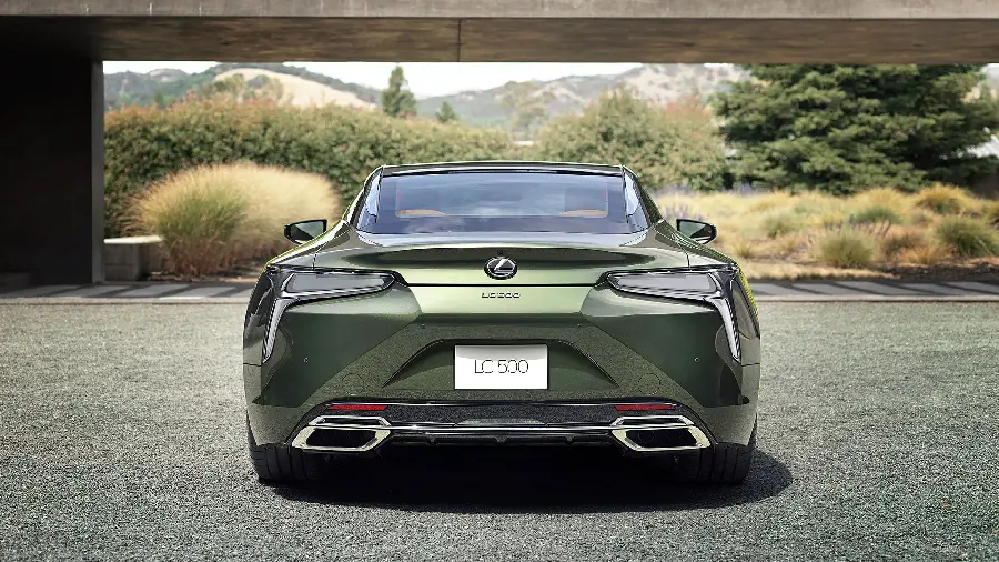 Olive green photo of the hood of a Lexus LC 500 under a bridge in the forest