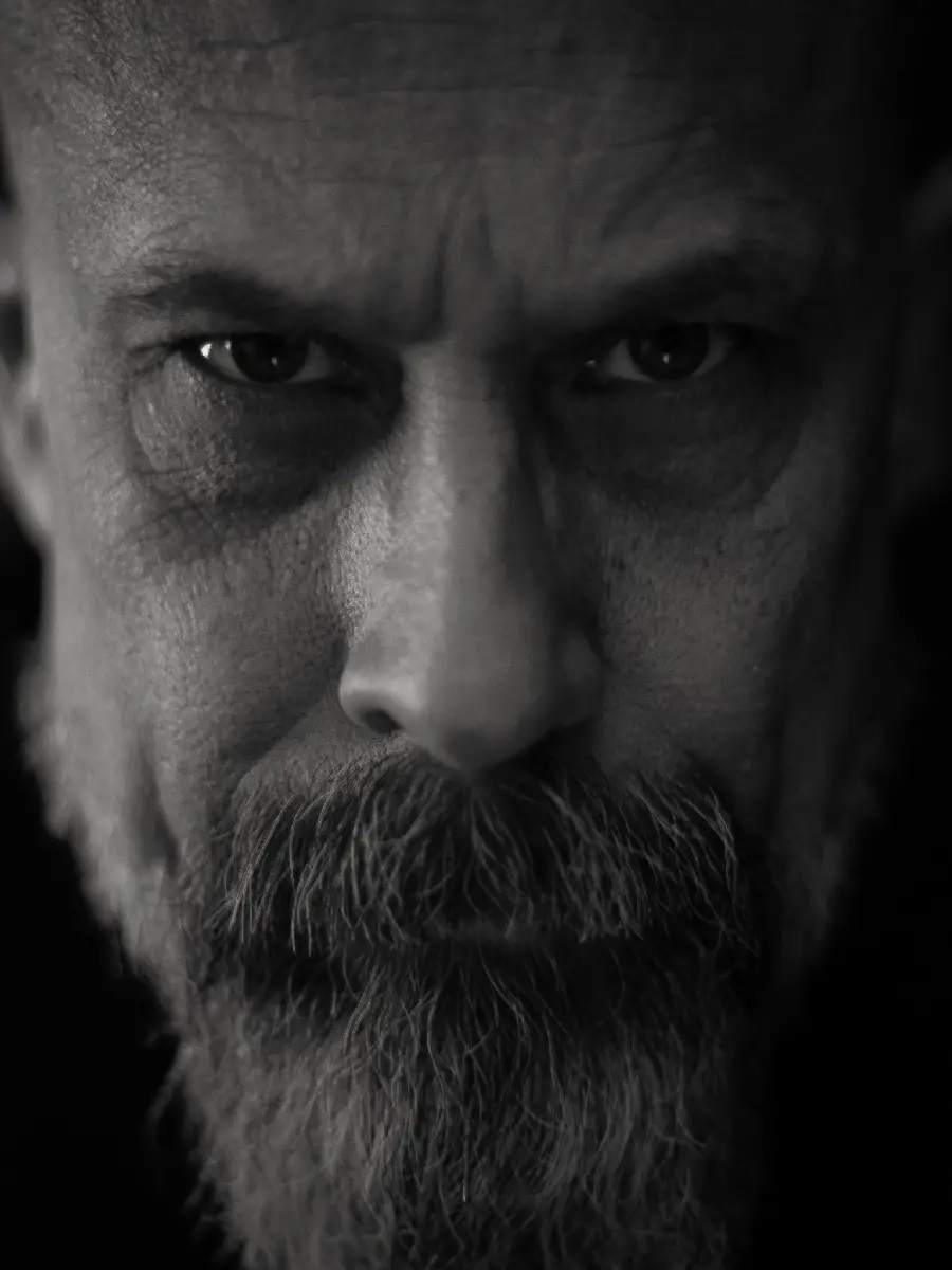 Attractive and heavy men's beard model in a special view