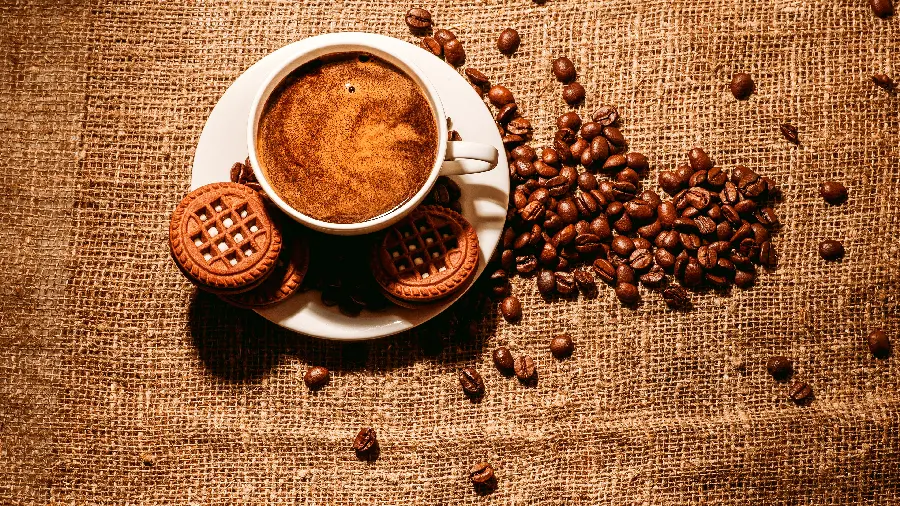 Lovely and sweet wallpaper with a coffee cup and biscuit design 