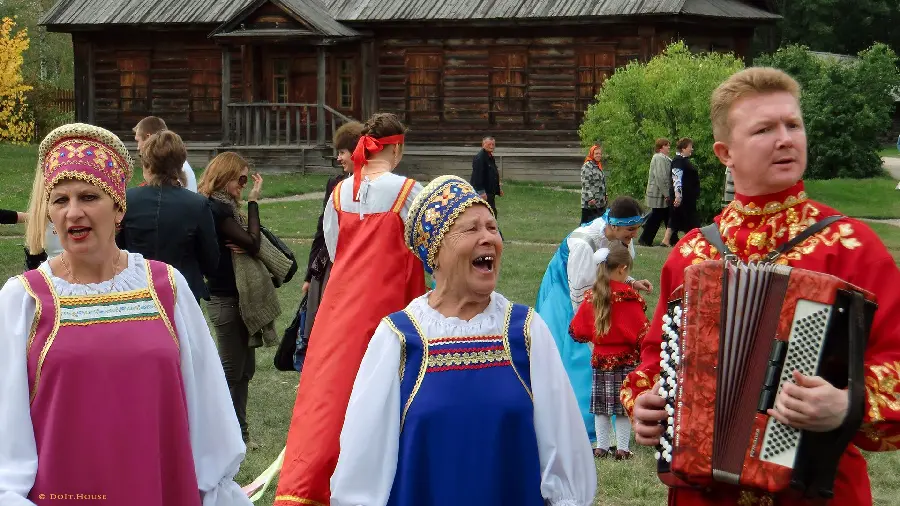 A high-quality and exciting background of girls in colorful national costumes in nature
