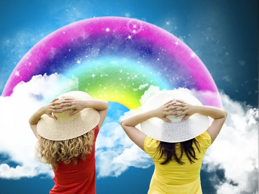 Dreamy wallpaper of two friends watching a beautiful rainbow