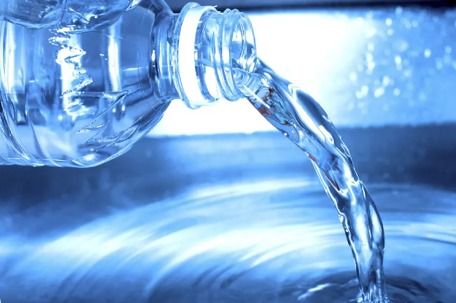 Clear image of drinking mineral water being poured