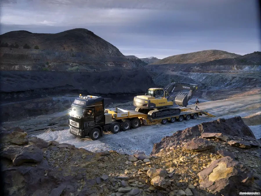 The latest image of an excavator on a large transport truck