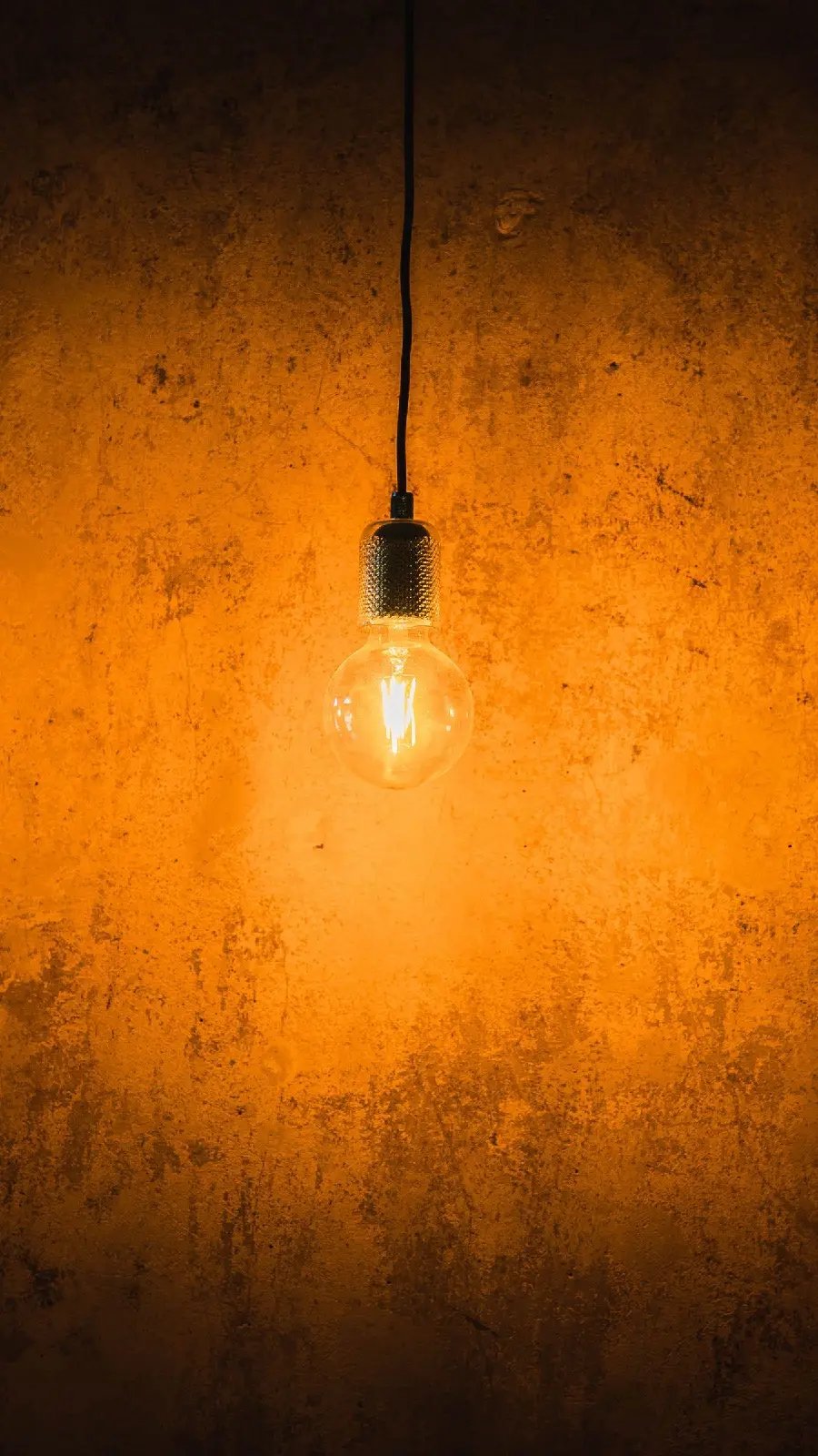Magical artistic image of a lighted lamp with a wall background 8k
