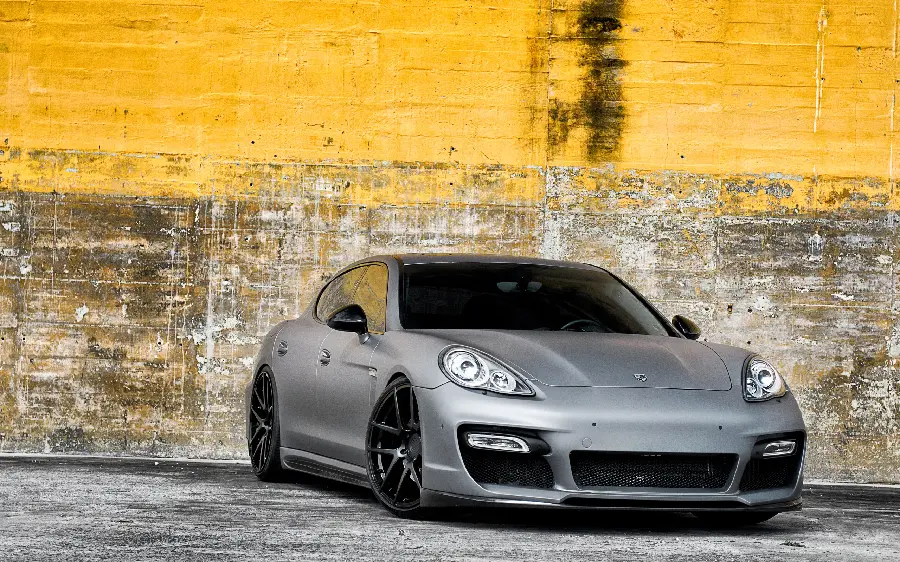 Stylish and luxurious wallpaper of a beautiful car with a yellow background for your computer