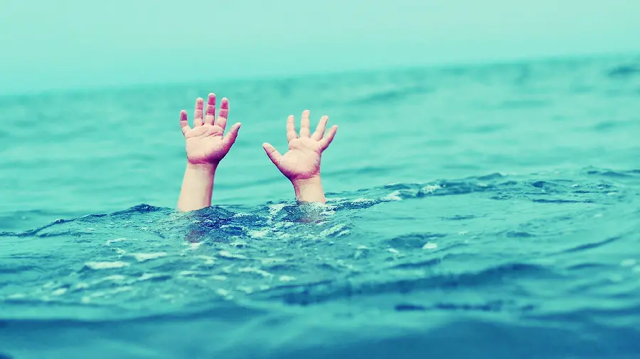 Download a unique photo of hands reaching out of the sea
