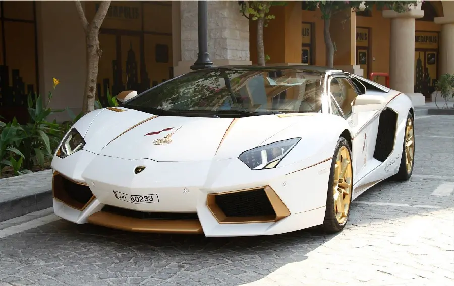 Stylish and shiny background of a new well-made Lamborghini in gold and white