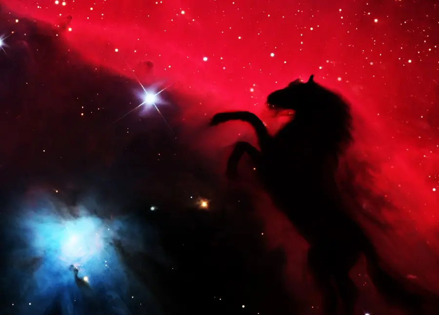 Download the red background of the black Horsehead Nebula in top quality