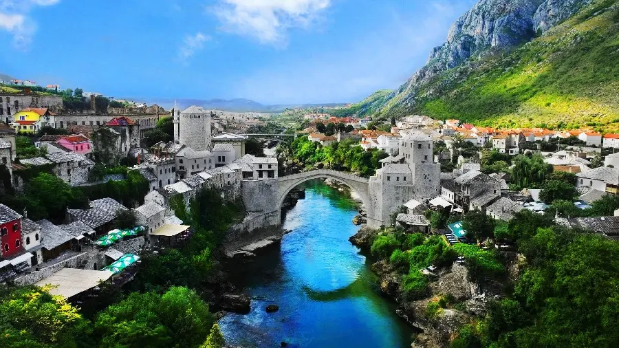 The most viewed nature background photo of a blue river between two foreign cities for laptops 