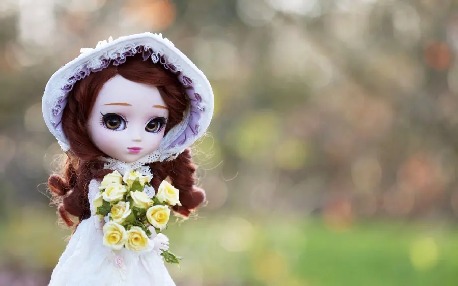 Cute doll girl in a wedding dress in nature in 8K quality 