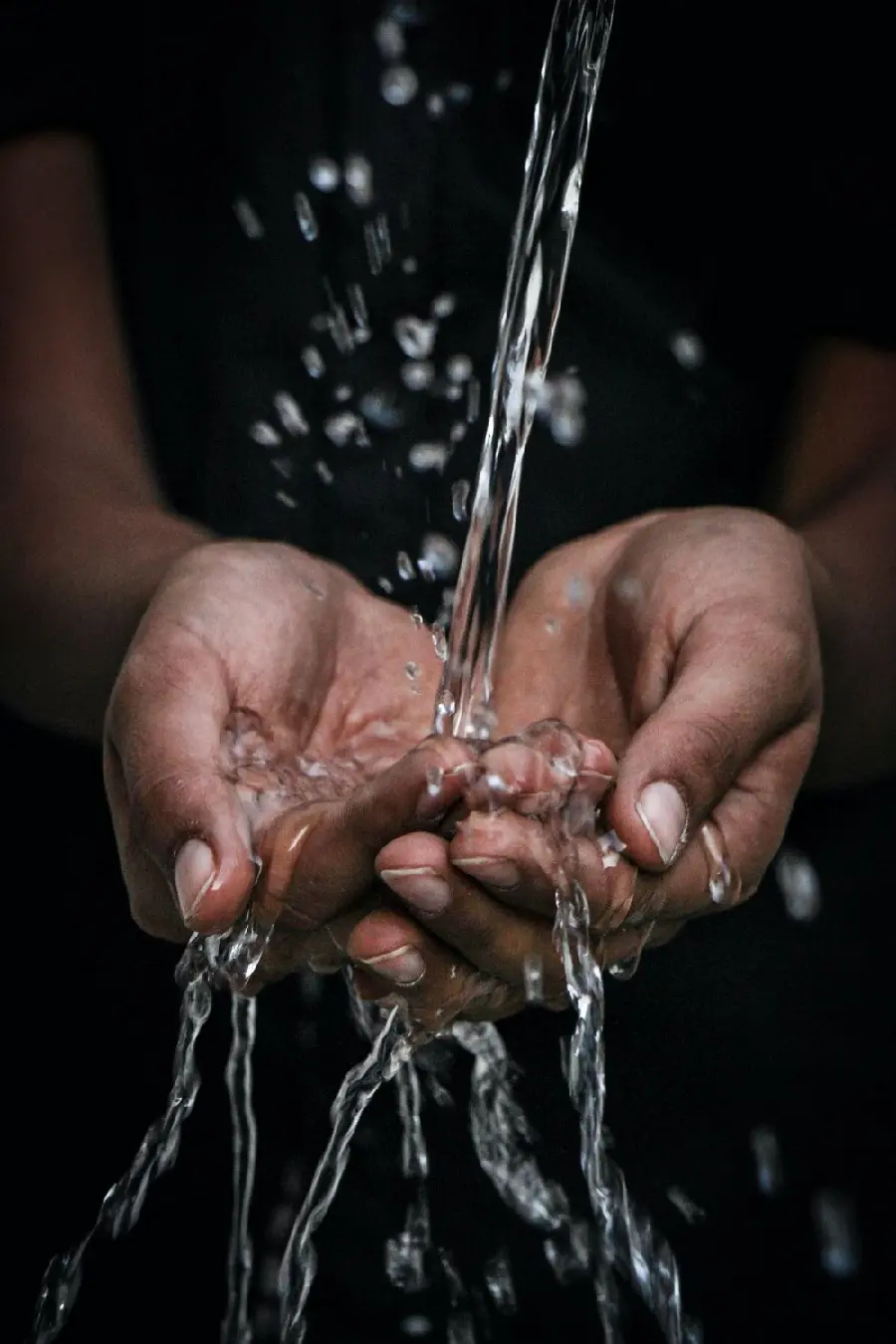 Download stock image of washing hands with clean drinking water
