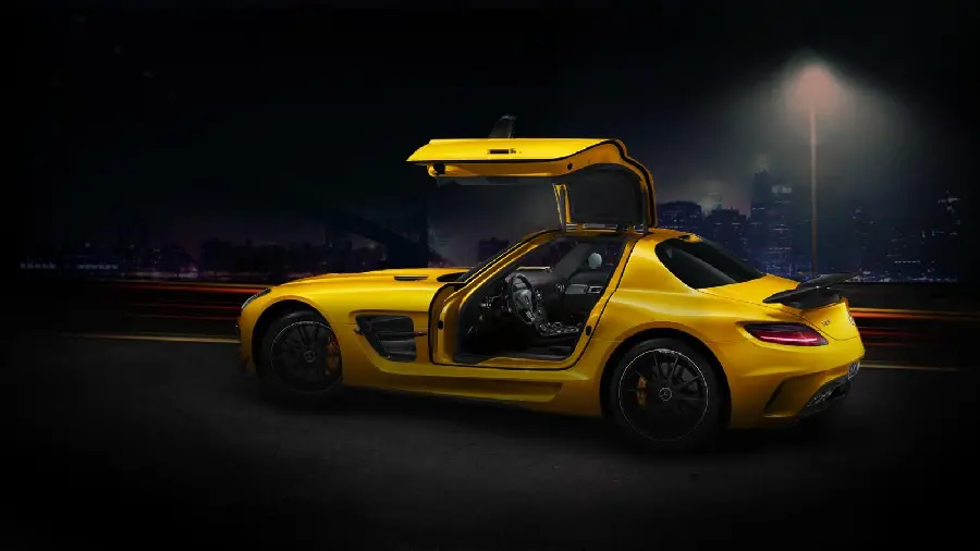 Photo of a yellow Mercedes-Benz with a beautiful design of its doors in HD quality suitable for laptops