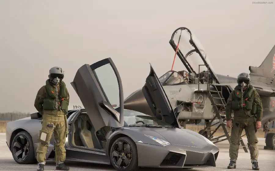 Wallpaper of a gray Lamborghini Runton next to a fighter jet and its two pilots
