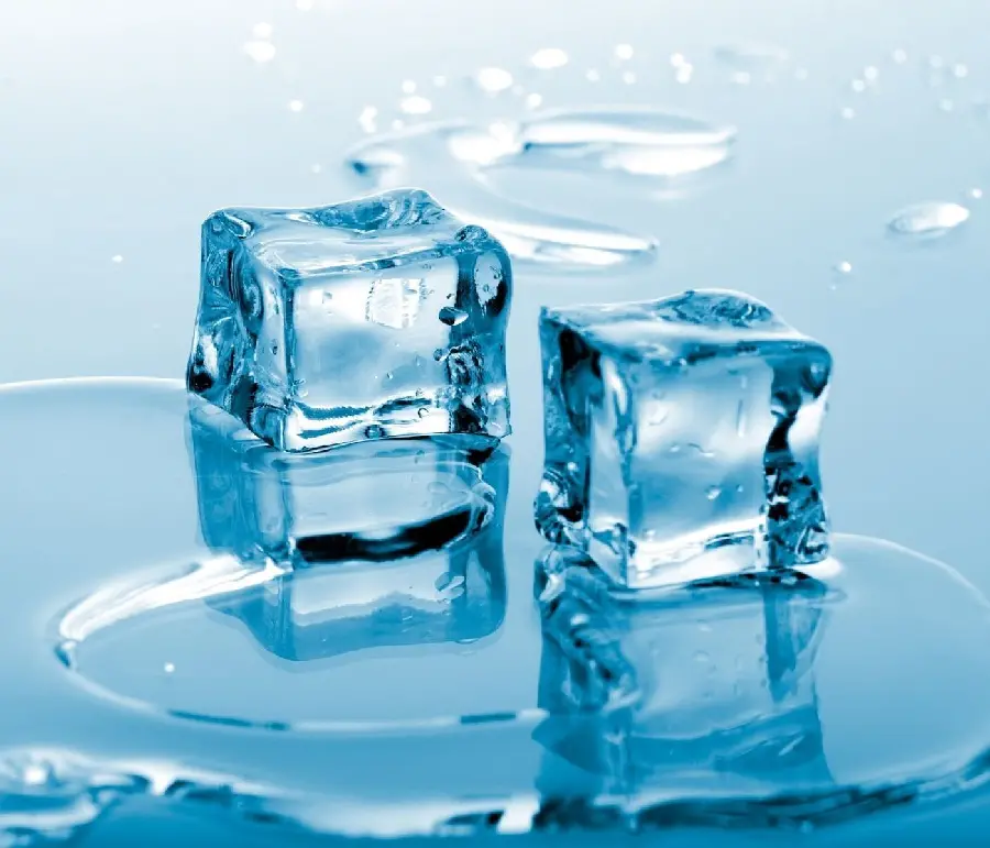 Special background of two cold ice cubes in blue space for desktop