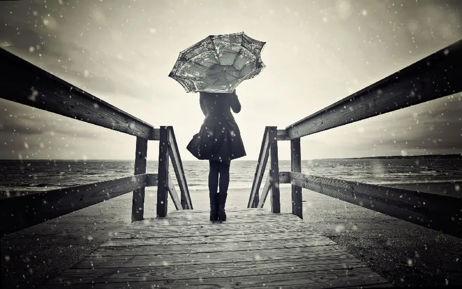Download a high-quality sad girl under the rain image