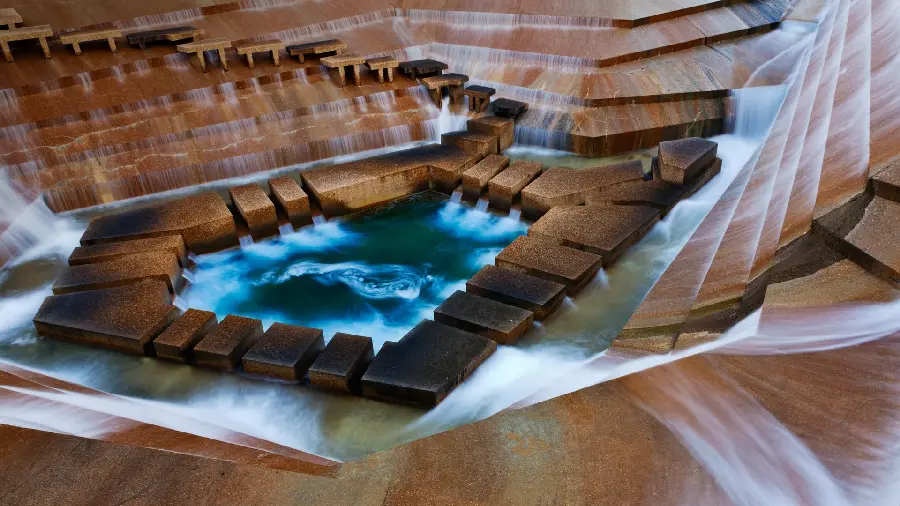Amazing vector of a wooden stepped fountain on 4 sides with blue ponds in nature and its landscape photo