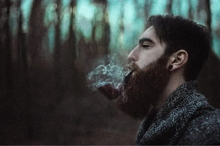 The most mysterious profile photo of a boy with a foreign model design with a handsome and long beard from the profile