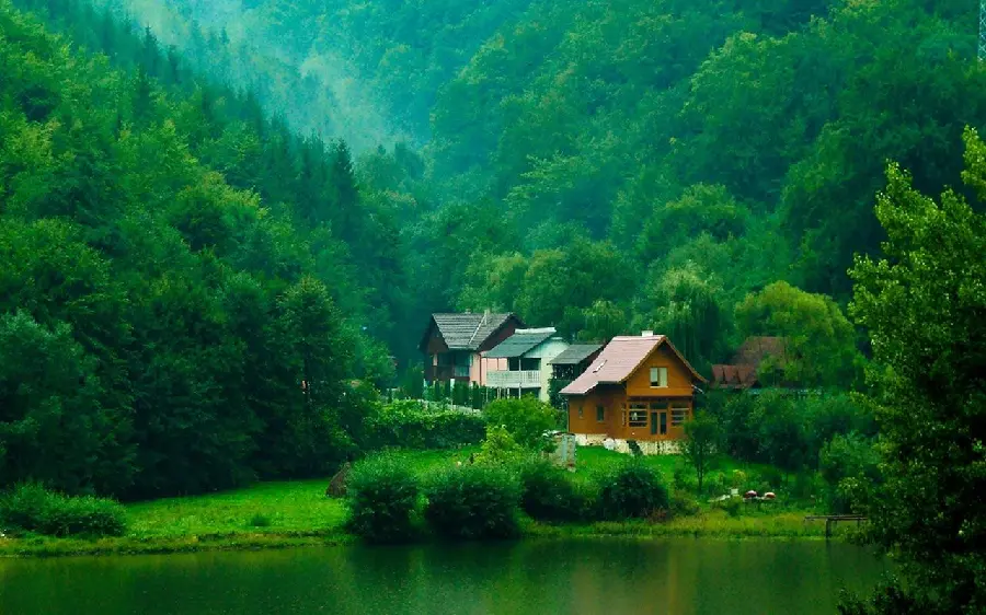 The most beautiful photo of a wooden hut in the heart of lush nature with high quality 