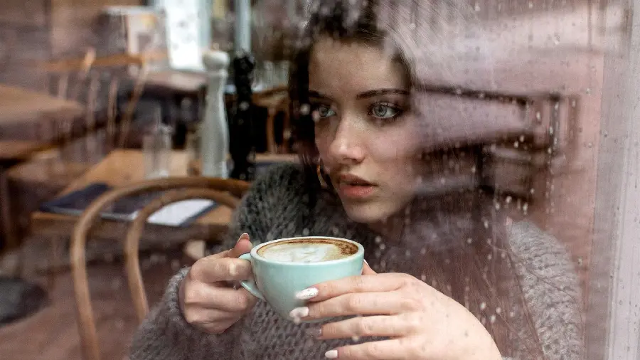 The most downloaded profile photo of a girl drinking coffee on a cold rainy day