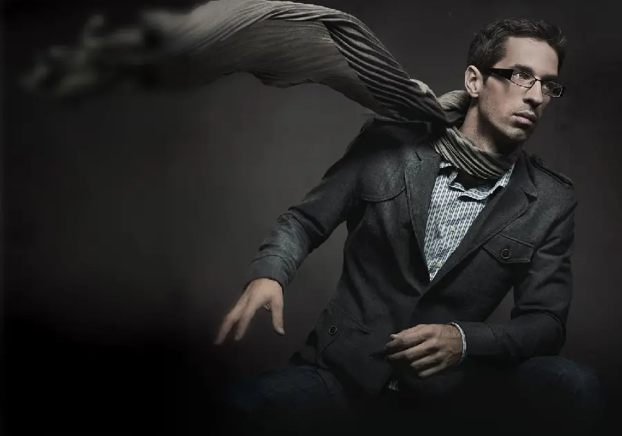 Interesting image of a male model with a special and long scarf
