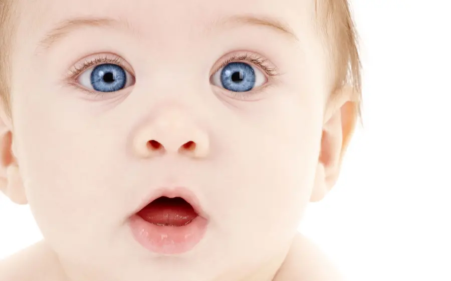 Download a bright picture of a little baby boy with blue eyes