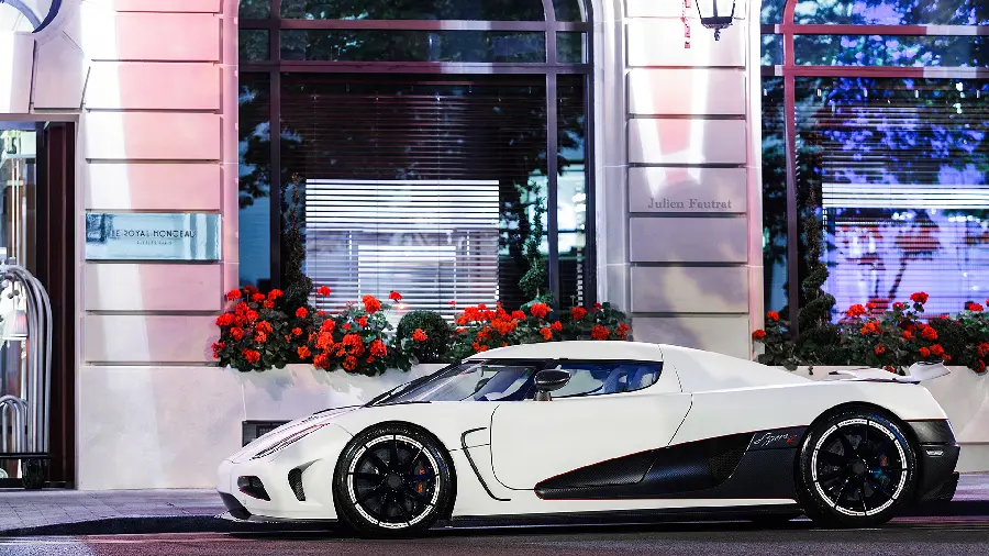 Amazing Poster with a White Advanced Car Design from the Side