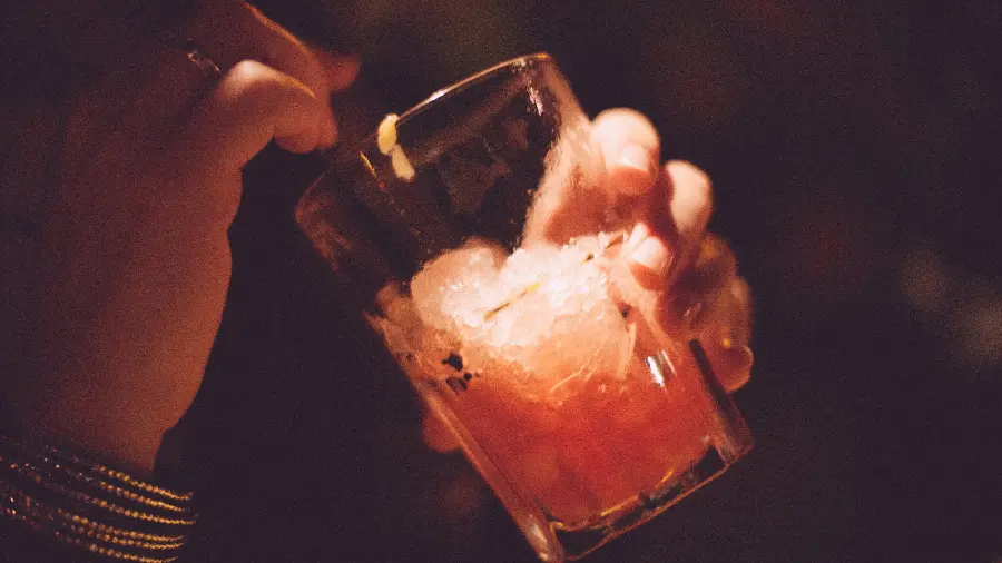 New picture of a girl drinking a drink with ice