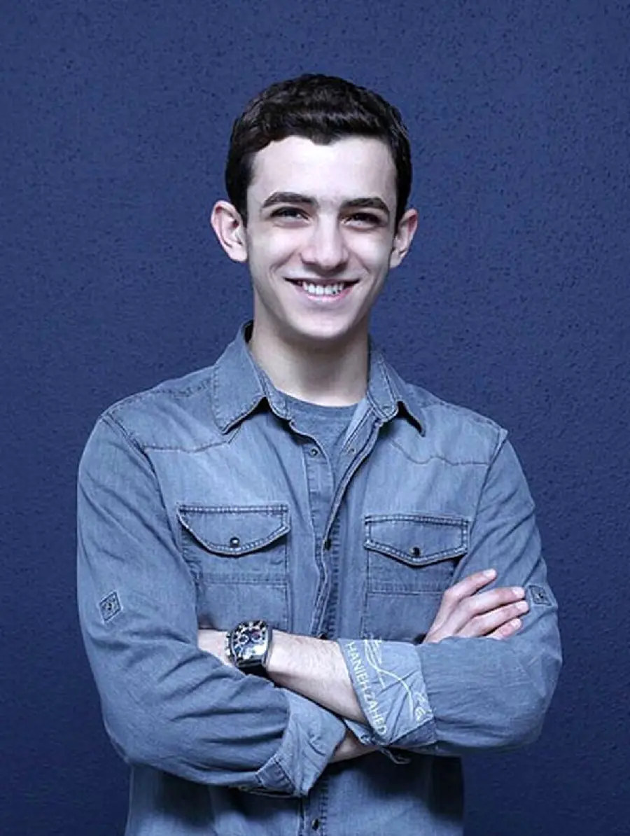 Ali Shadman smiling with A denim shirt on a great body for wallpaper
