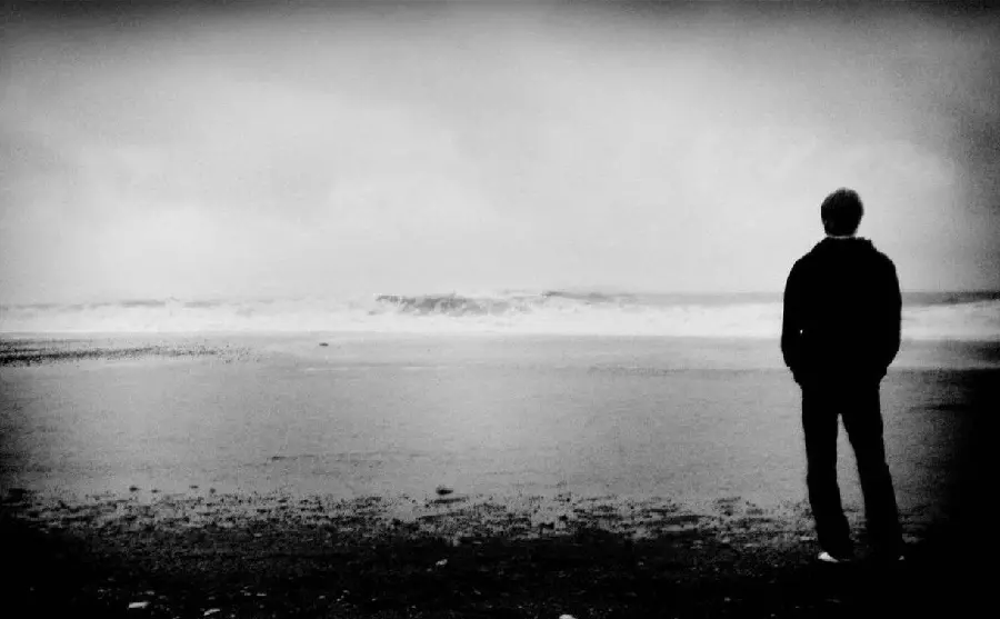 High quality black and white sad image of a lonely man