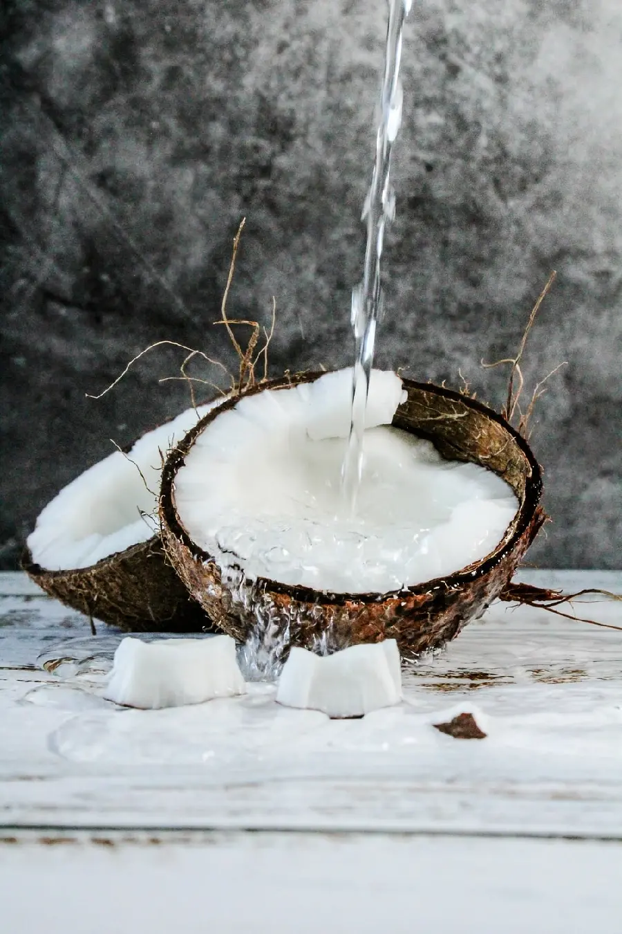 Download a spectacular mobile wallpaper of a cold coconut drink in 4K quality