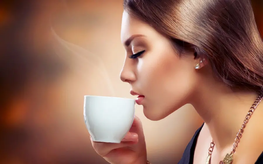 High quality wallpaper of a profile of a girl drinking for desktop 