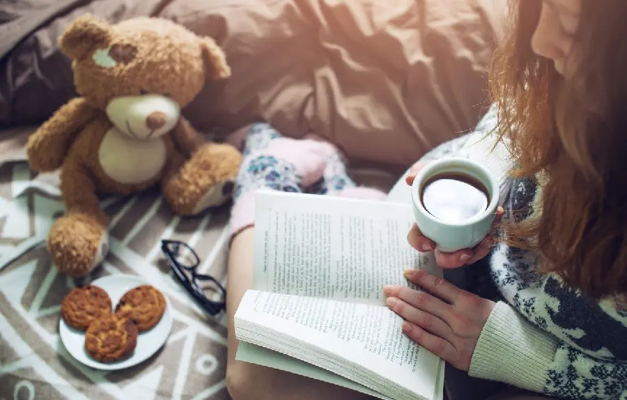 A picture of a girl drinking and studying in Full HD quality