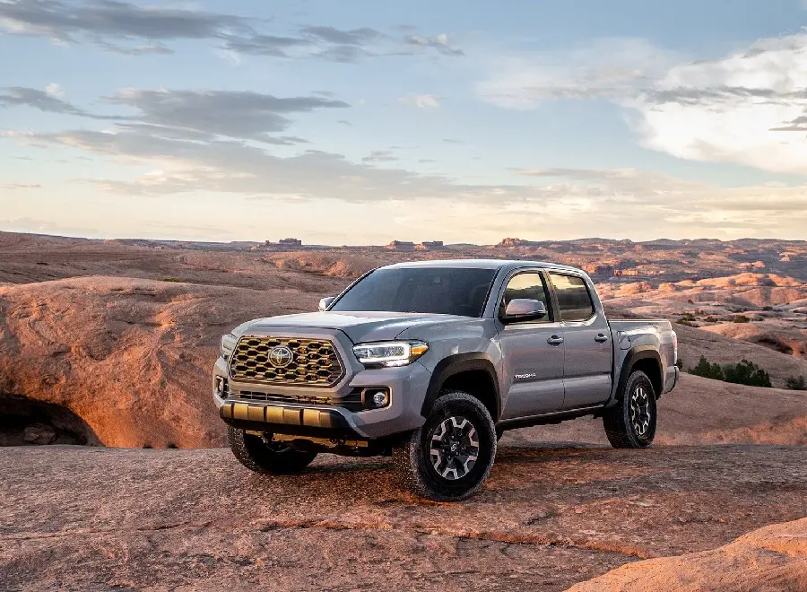 Download Lovely Stock Photo of a Toyota Tacoma on the Edge of the Cliff