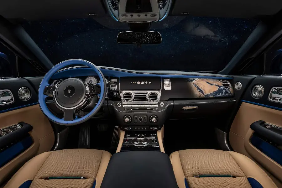 Stock Photo of Brown and Black Interior of Rolls Royce with Blue Steering Wheel