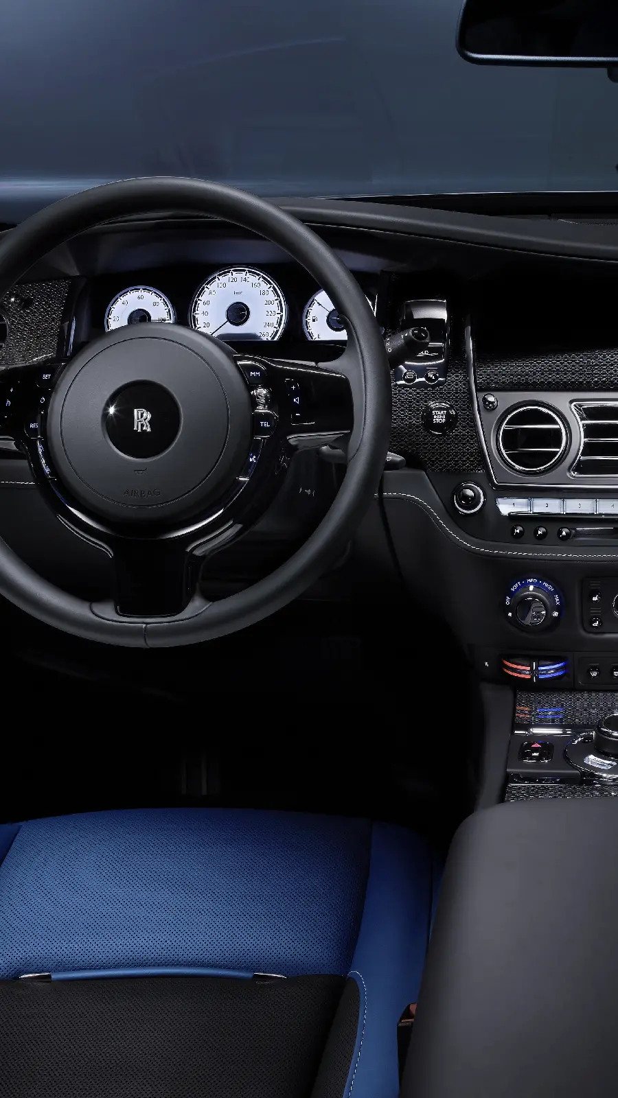 A spectacular wallpaper from the interior of the Rolls Royce car from behind the wheel
