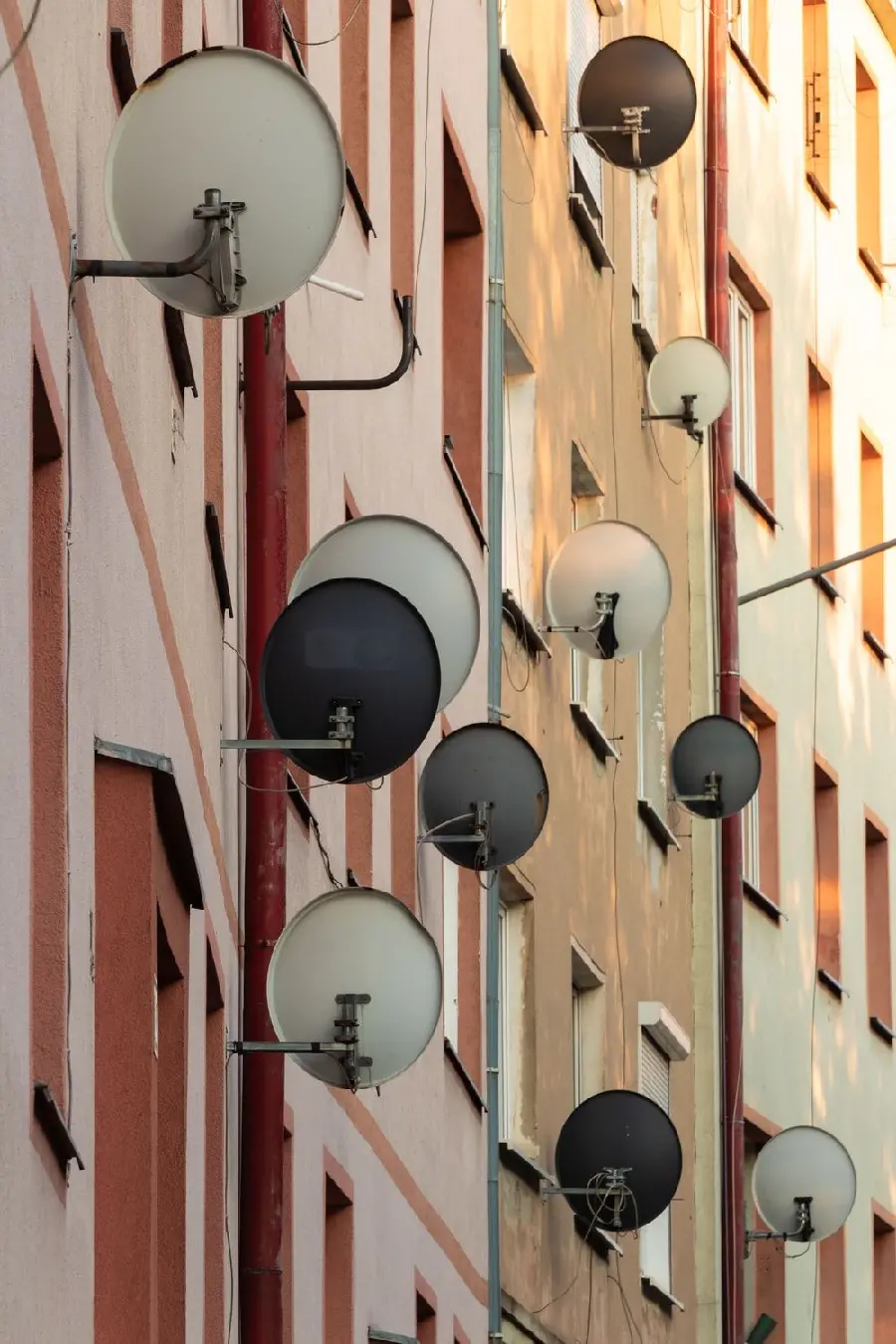 Interesting wallpaper of a satellite dish coming out of the house