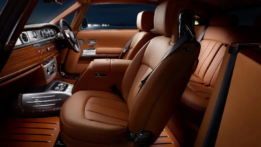 The brightest chocolate-colored background of the interior of a Rolls Royce suitable for phones