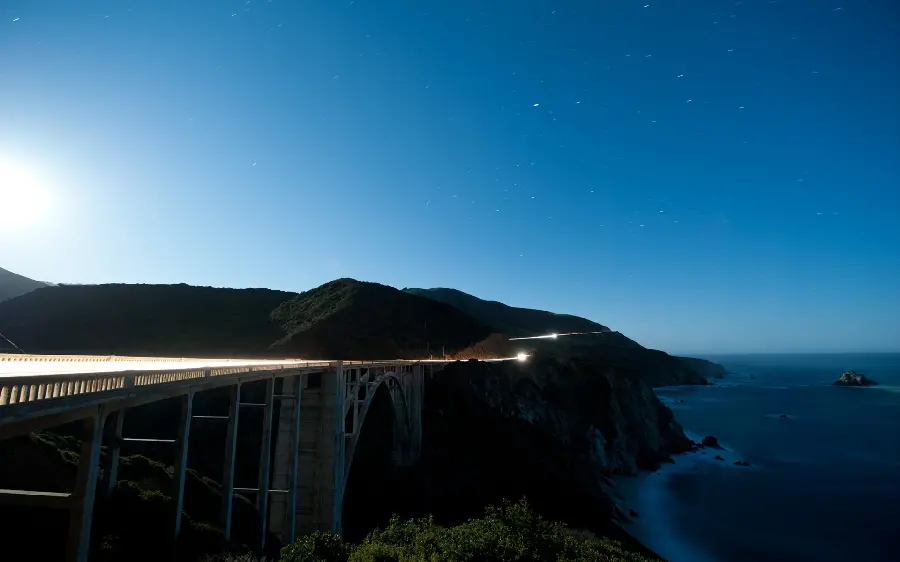  Dark pictures of a bridge in the nature of the mountains with an incredible and extraordinary view