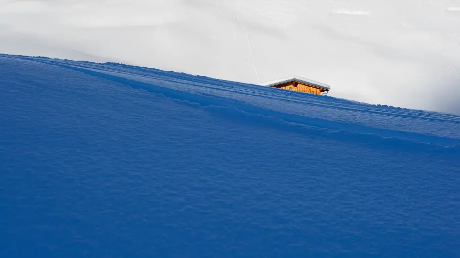 Download unique and beautiful stock photo of a house in the snow